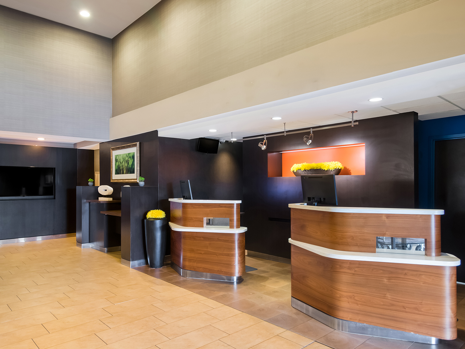 Front desk and lobby area at Sonesta Select Dallas Richardson.