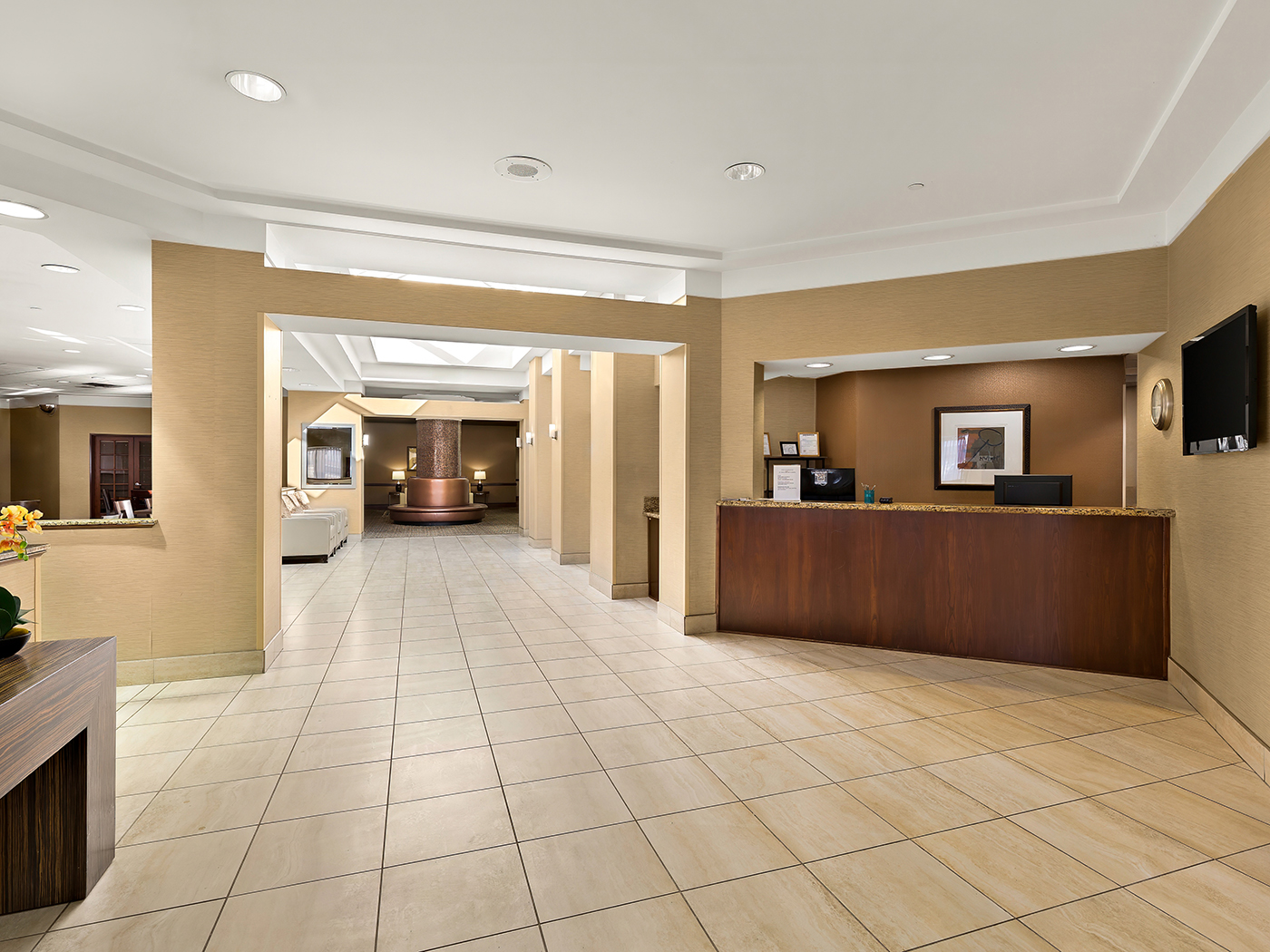 The lobby and front desk at Hotel RL Cleveland Airport West.
