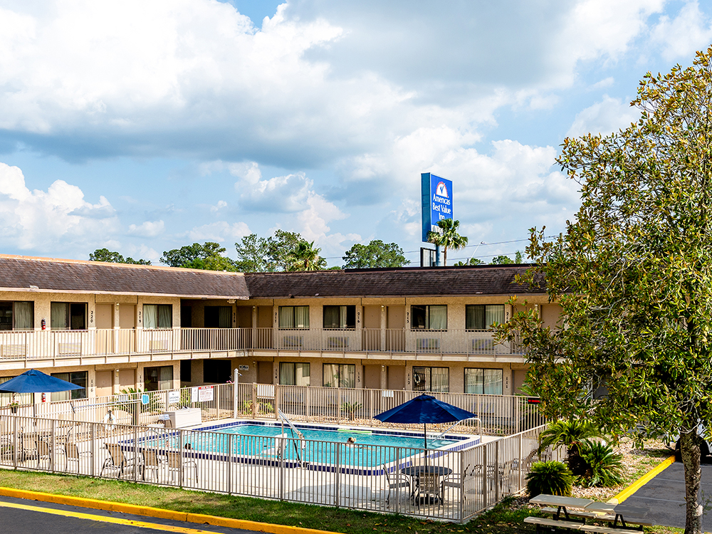 Exterior and Pool at Americas Best Value Inn Lake City