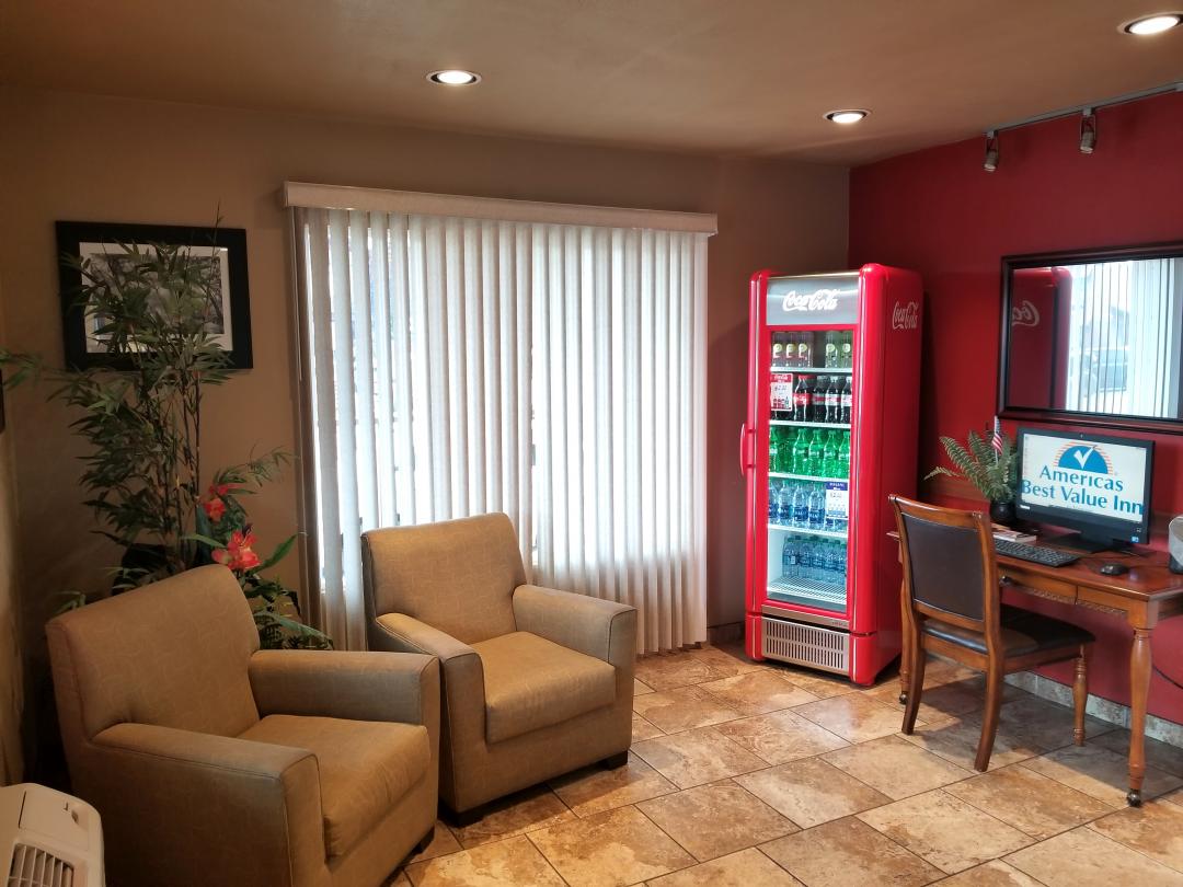 Lobby sitting area, business center, and vending machine