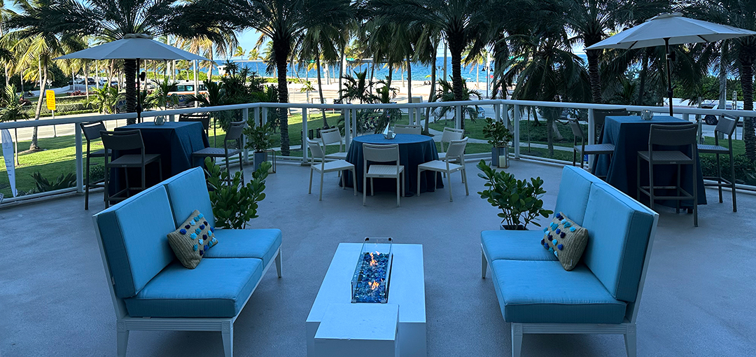 2ONE2 Breeze Lounge's outdoor dining and sitting area at the Sonesta Fort Lauderdale Beach hotel.
