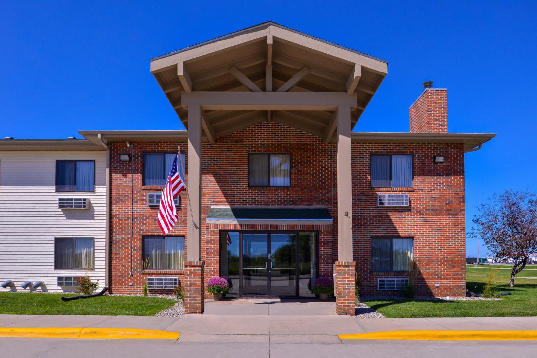 Hotel exterior and entrance with American flag