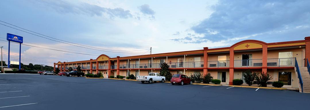 Exterior View of Hotel and Parking Lot