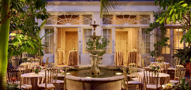 Outdoor seating with fountain at New Orleans Hotel