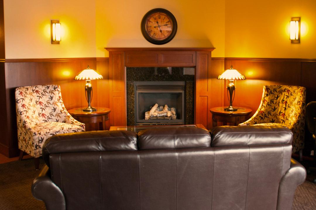 Lobby with Leather Couch and Fireplace