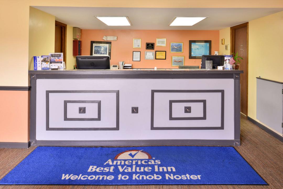 Hotel lobby with Front Desk and welcome mat