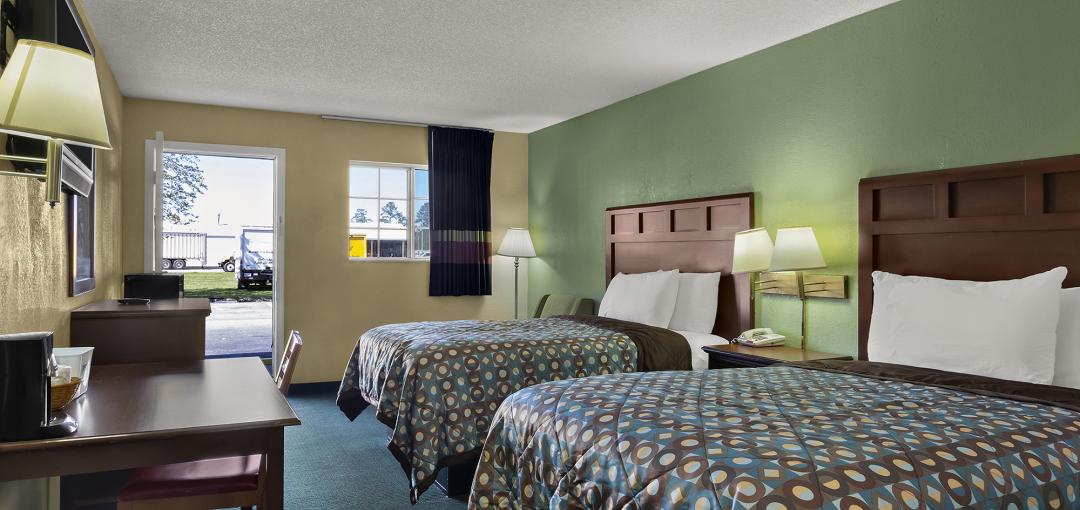 A room with two beds at the Americas Best Value Inn Edenton hotel.