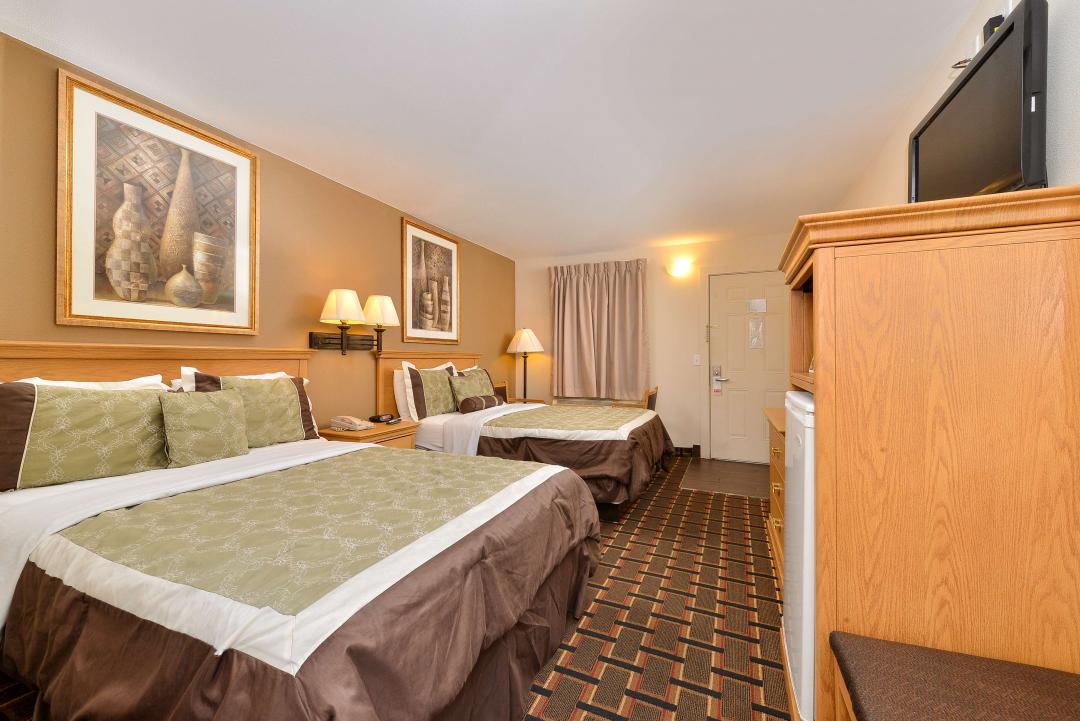 Spacious clean two queen guestroom and amnities